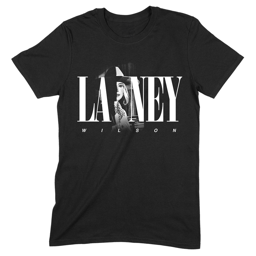 Official Lainey Wilson Merchandise. Black, 100% cotton unisex semi fitted t-shirt featuring a black white logo photo of Lainey.